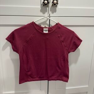 Athleta Girl pink shirt sleeve crop top. Size L/12